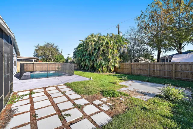 a view of a backyard with a garden