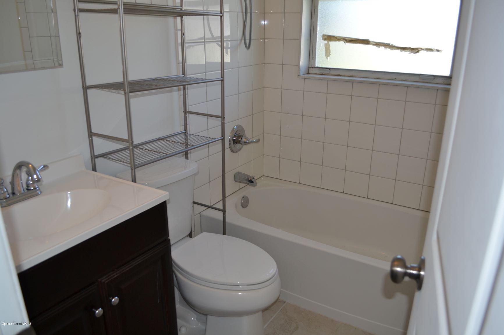 130 Delmar Street Indialantic, FL 32903 - Photo 12 of 21 130 DEL MAR 10.13.18 PHOTO INSIDE BATHRO