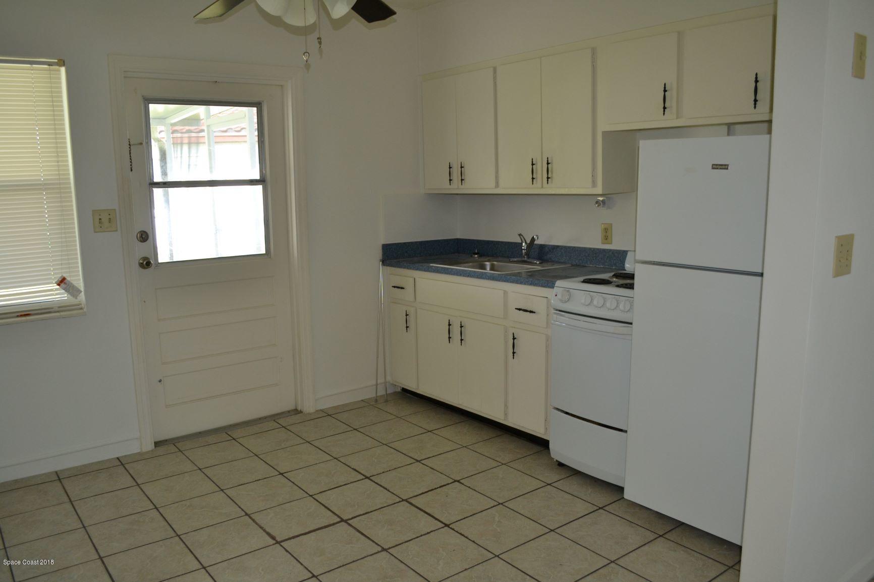 130 Delmar Street Indialantic, FL 32903 - Photo 9 of 21 130 DEL MAR 10.13.18 PHOTO INSIDE KITCHE