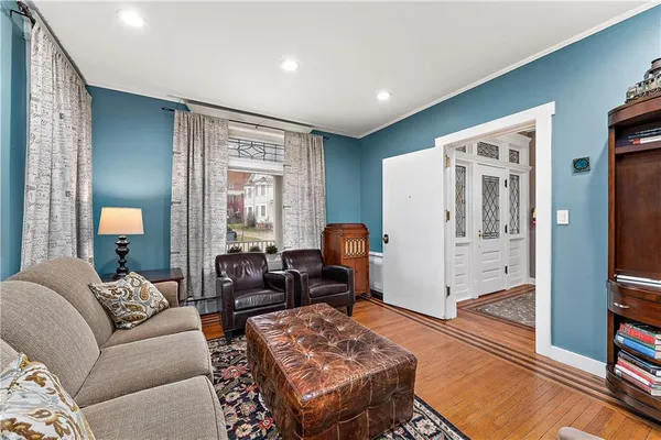 a living room with furniture and a window