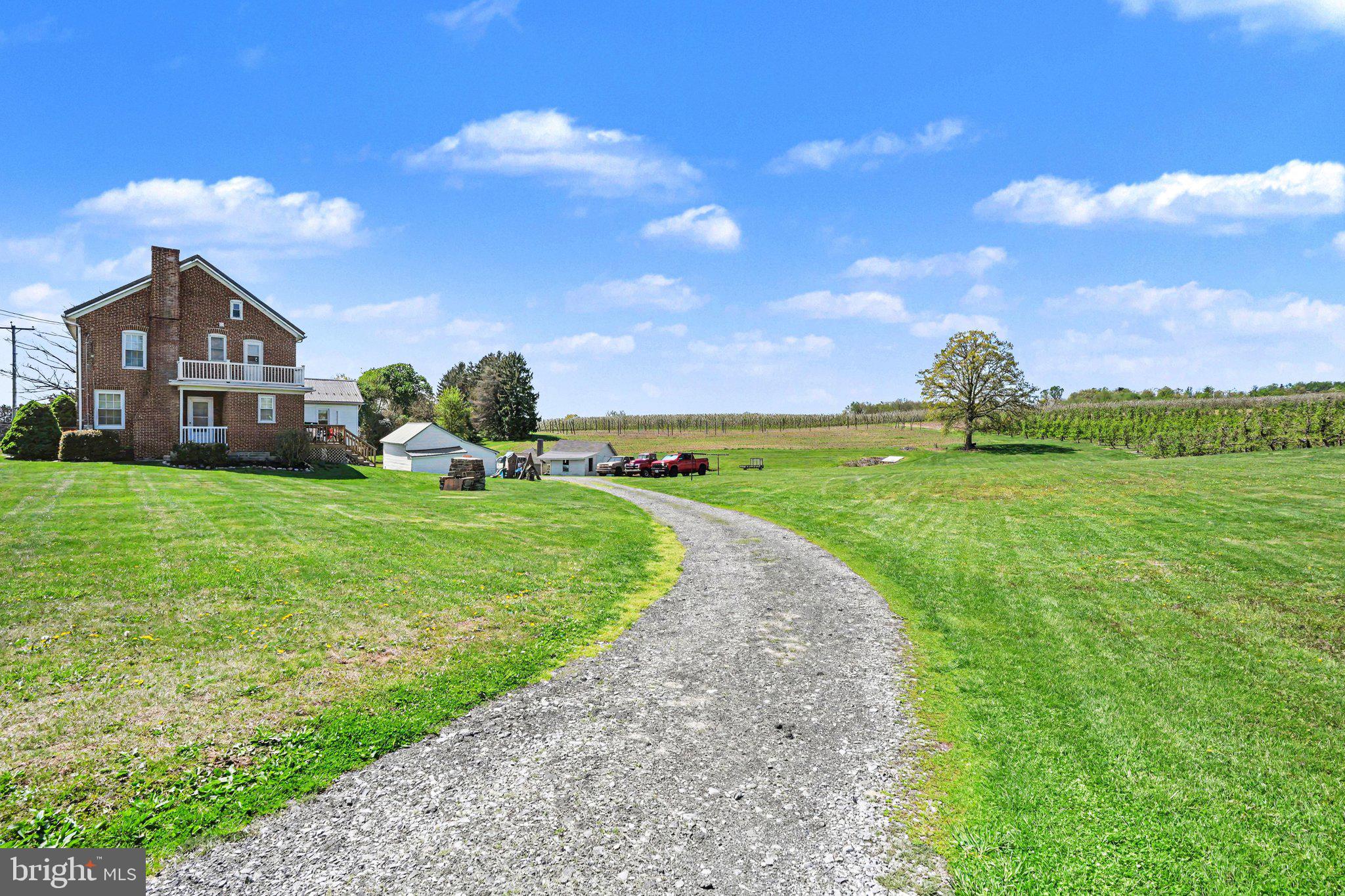 420 Carlisle Road Biglerville, PA 17307 - Photo 33 of 41 a front view of a house with garden