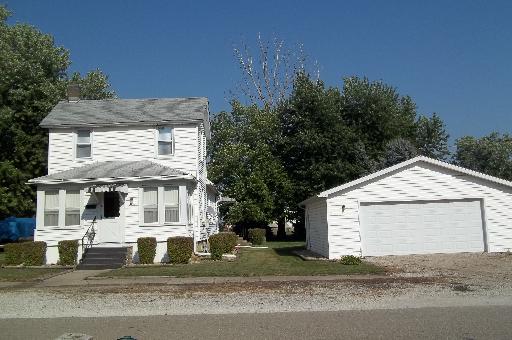 345 Porter Avenue Grand Ridge, IL 61325 - Photo 2 of 14 a front view of a house with a yard and garage