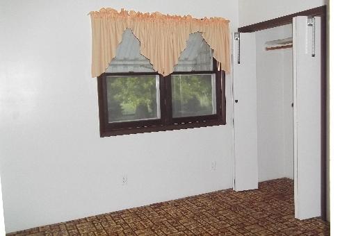 345 Porter Avenue Grand Ridge, IL 61325 - Photo 9 of 14 a room that has a window and a table in it