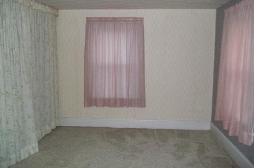 345 Porter Avenue Grand Ridge, IL 61325 - Photo 10 of 14 a view of an empty room with a window