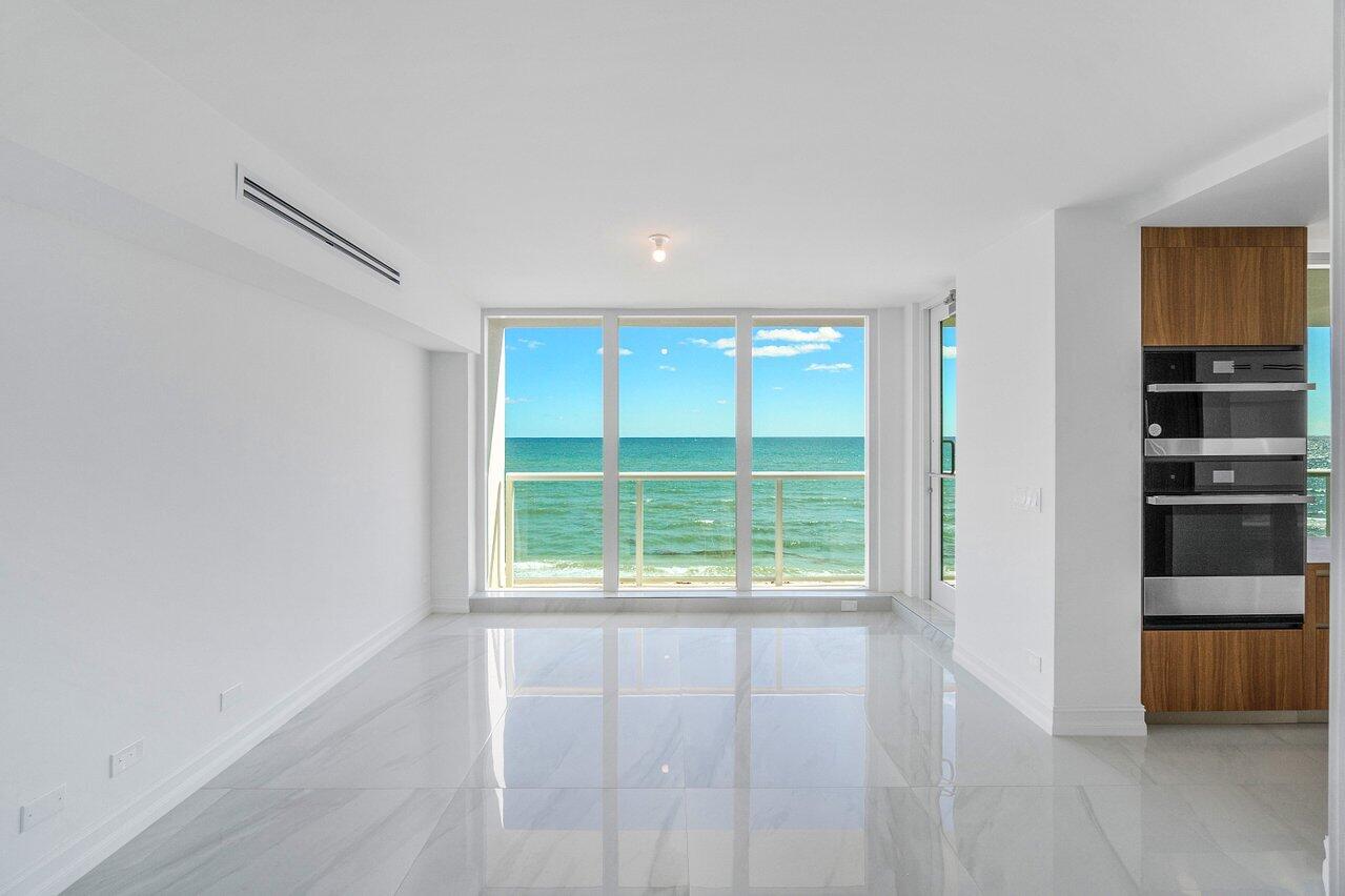 3505 South Ocean Boulevard, Unit 4S Highland Beach, FL 33487 - Photo 21 of 48 a view of an empty room with a window