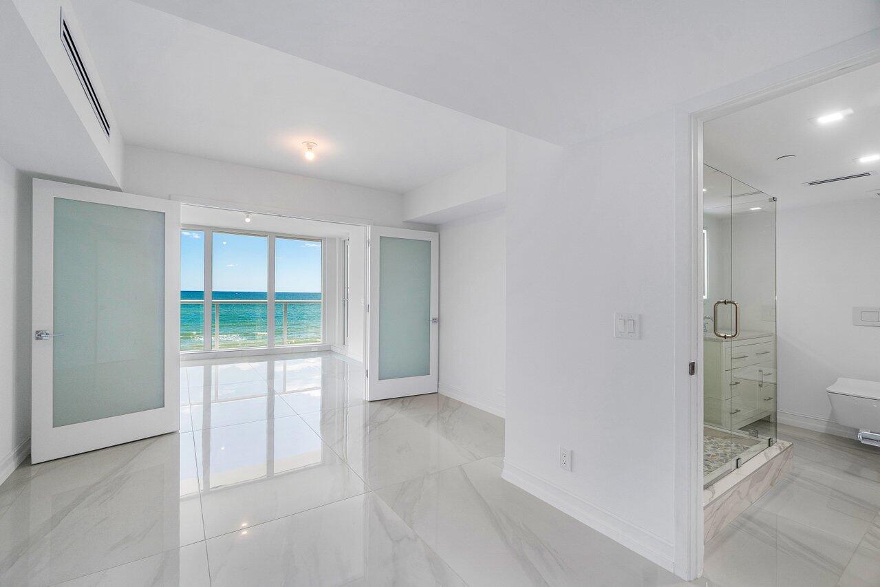 3505 South Ocean Boulevard, Unit 4S Highland Beach, FL 33487 - Photo 24 of 48 a view of an empty room with a window