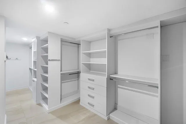 a view of an empty walk in closet