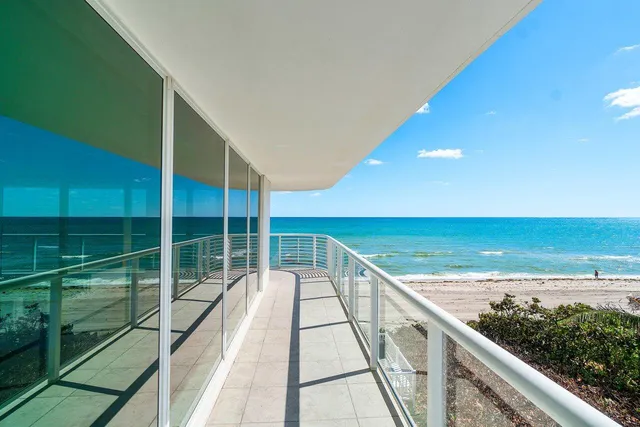a view of balcony with ocean view