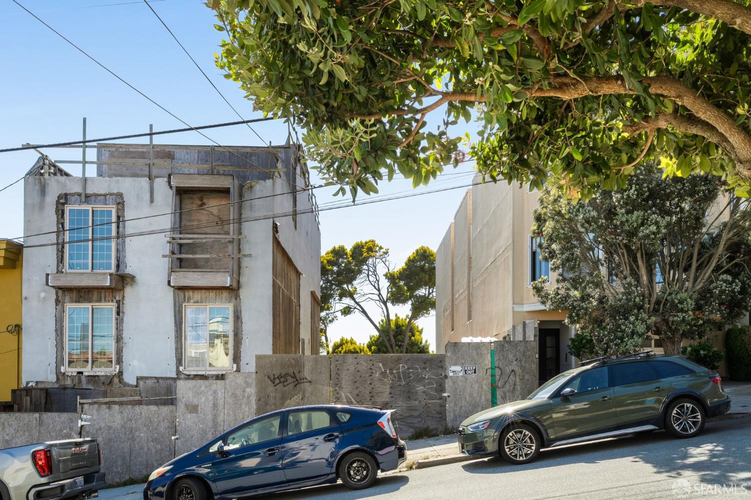 a car parked in front of a house
