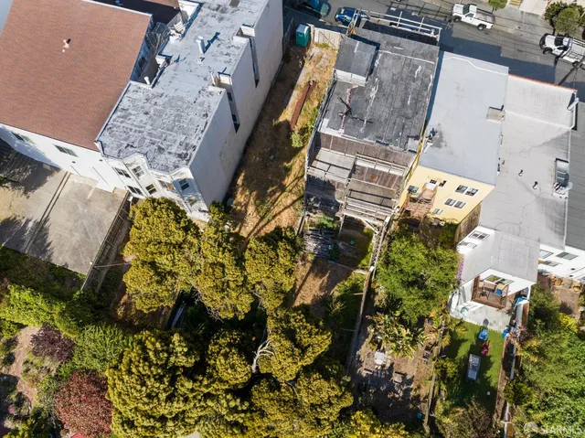 a bird view of multi story residential apartment building