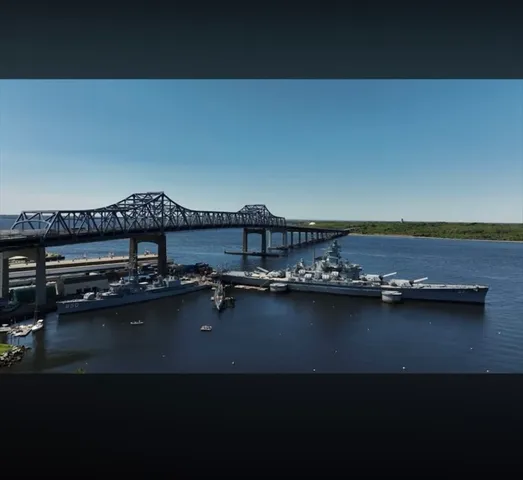 a view of a city with lawn chairs