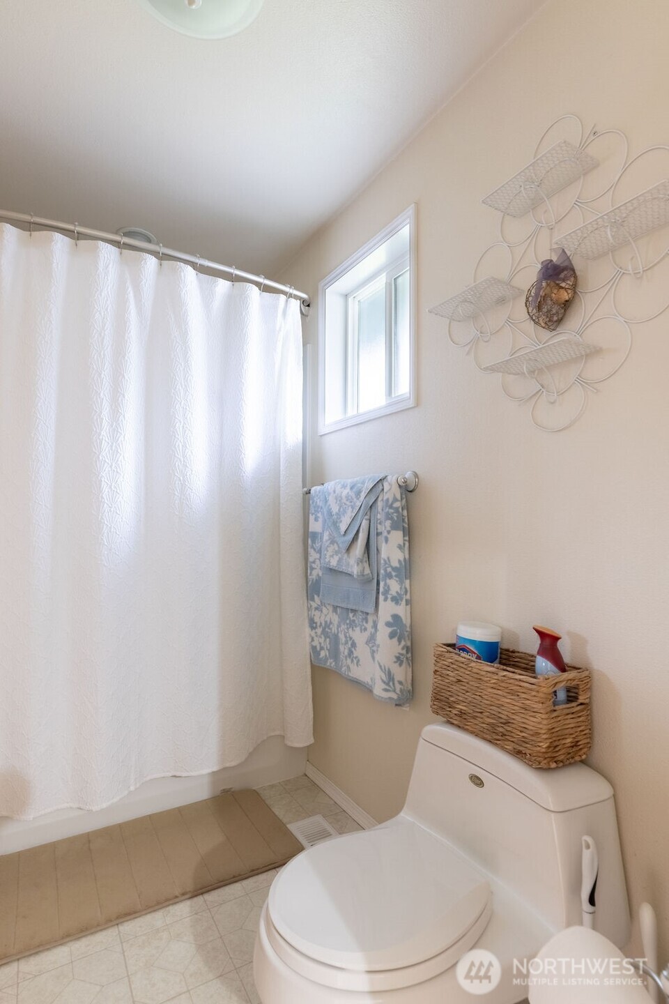 194 Sekiu Airport Road Sekiu, WA 98381 - Photo 12 of 40 a white toilet sitting next to a bathroom sink