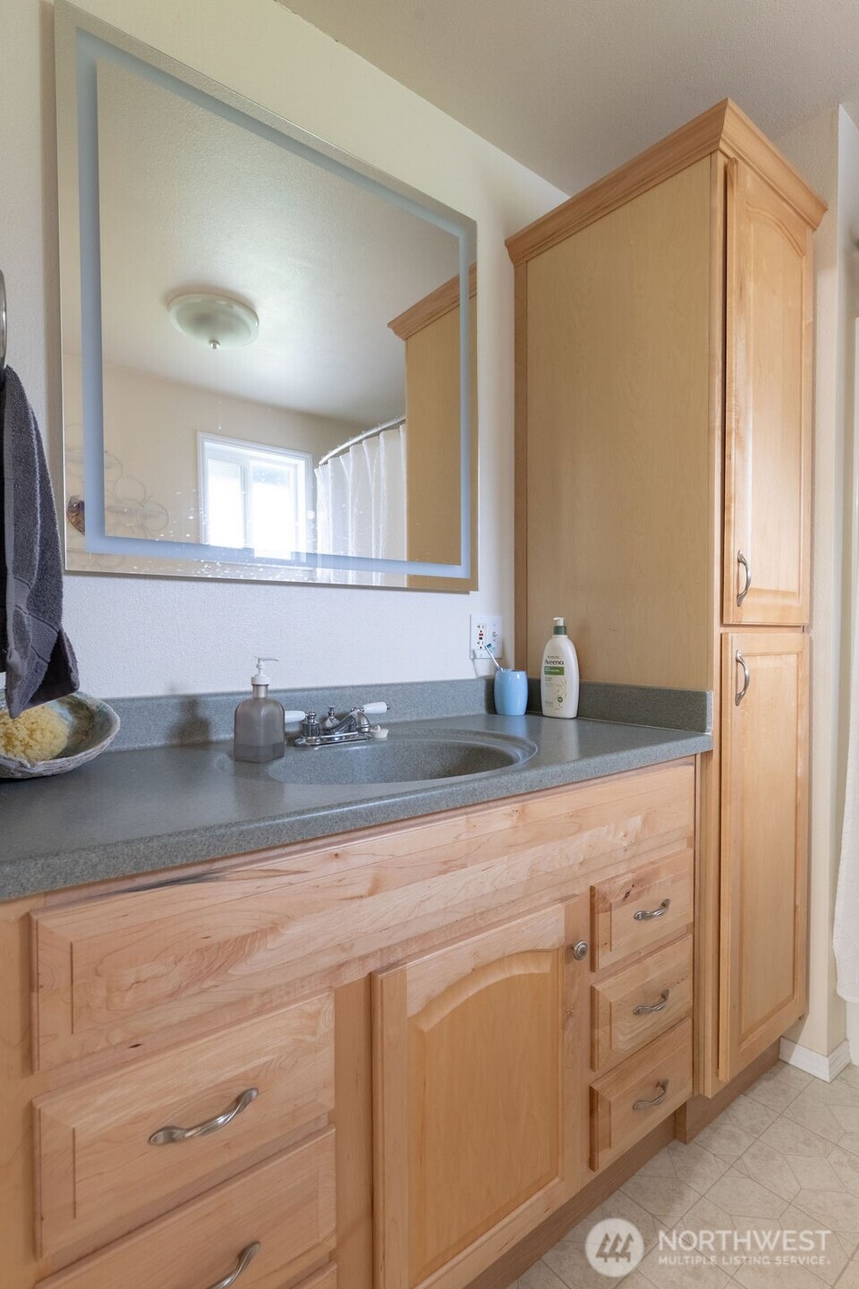 194 Sekiu Airport Road Sekiu, WA 98381 - Photo 13 of 40 a bathroom with a sink and a mirror