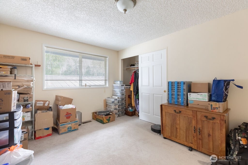 194 Sekiu Airport Road Sekiu, WA 98381 - Photo 18 of 40 a room with furniture and a window