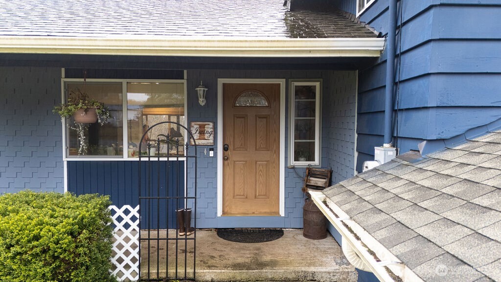 194 Sekiu Airport Road Sekiu, WA 98381 - Photo 2 of 40 a front view of a house with a porch