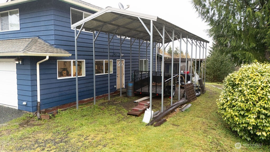 194 Sekiu Airport Road Sekiu, WA 98381 - Photo 33 of 40 a view of a house with a yard
