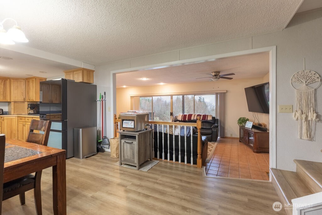 194 Sekiu Airport Road Sekiu, WA 98381 - Photo 8 of 40 a view of a living room kitchen and a kitchen