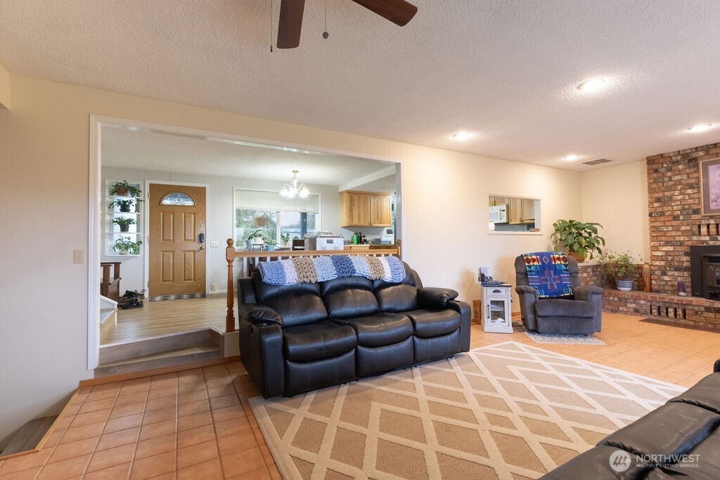 194 Sekiu Airport Road Sekiu, WA 98381 - Photo 10 of 40 a living room with furniture and a wooden floor