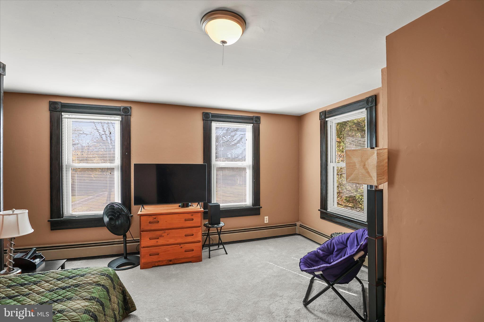 3220 Mt Carmel Road Upperco, MD 21155 - Photo 14 of 44 a living room with furniture and a flat screen tv