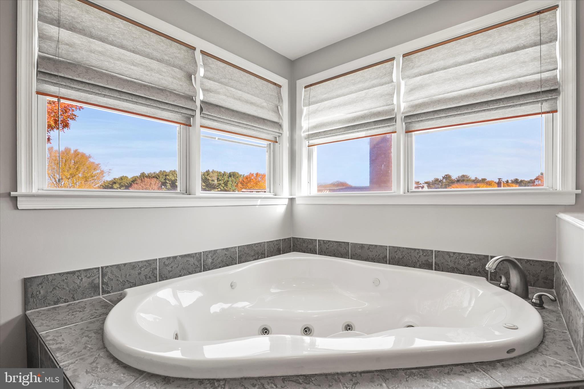 3220 Mt Carmel Road Upperco, MD 21155 - Photo 19 of 44 a white bath tub sitting next to a window