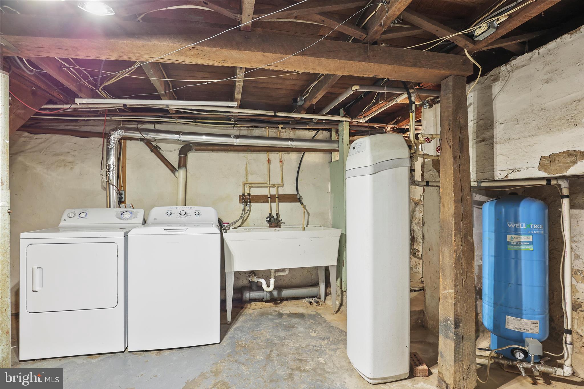 3220 Mt Carmel Road Upperco, MD 21155 - Photo 21 of 44 a utility room with dryer and washer