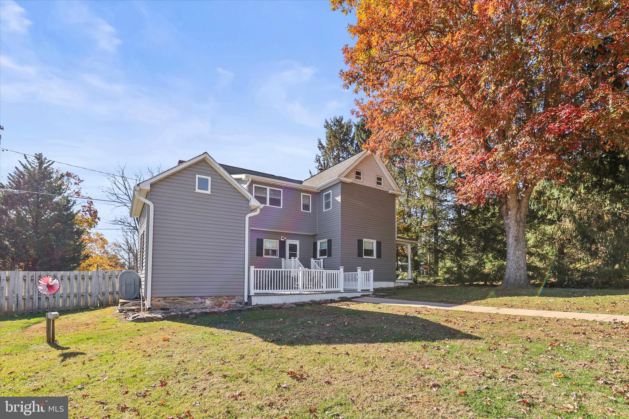 3220 Mt Carmel Road Upperco, MD 21155 - Photo 25 of 44 a front view of house with yard and trees