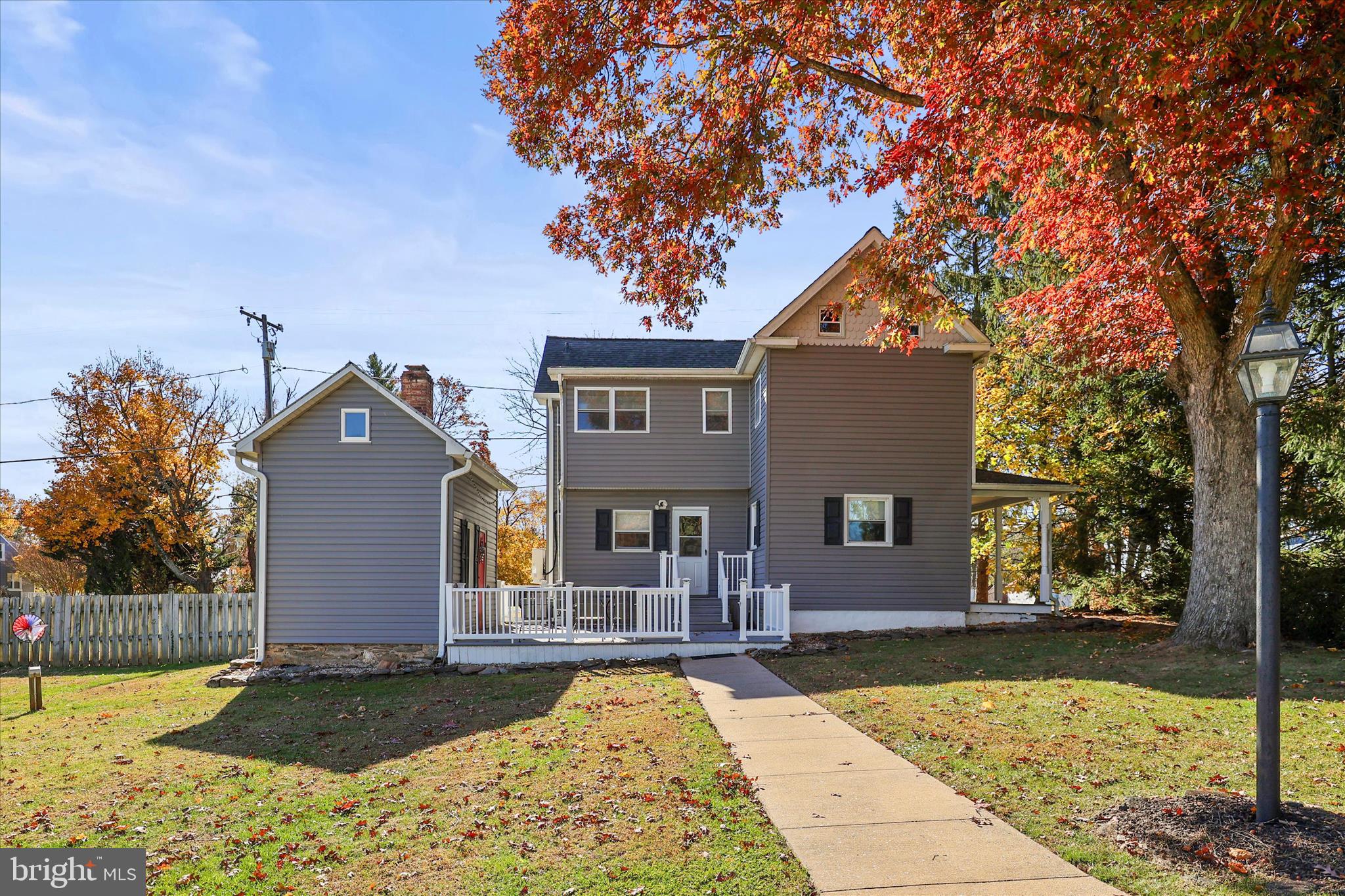 3220 Mt Carmel Road Upperco, MD 21155 - Photo 26 of 44 a front view of a house with a yard