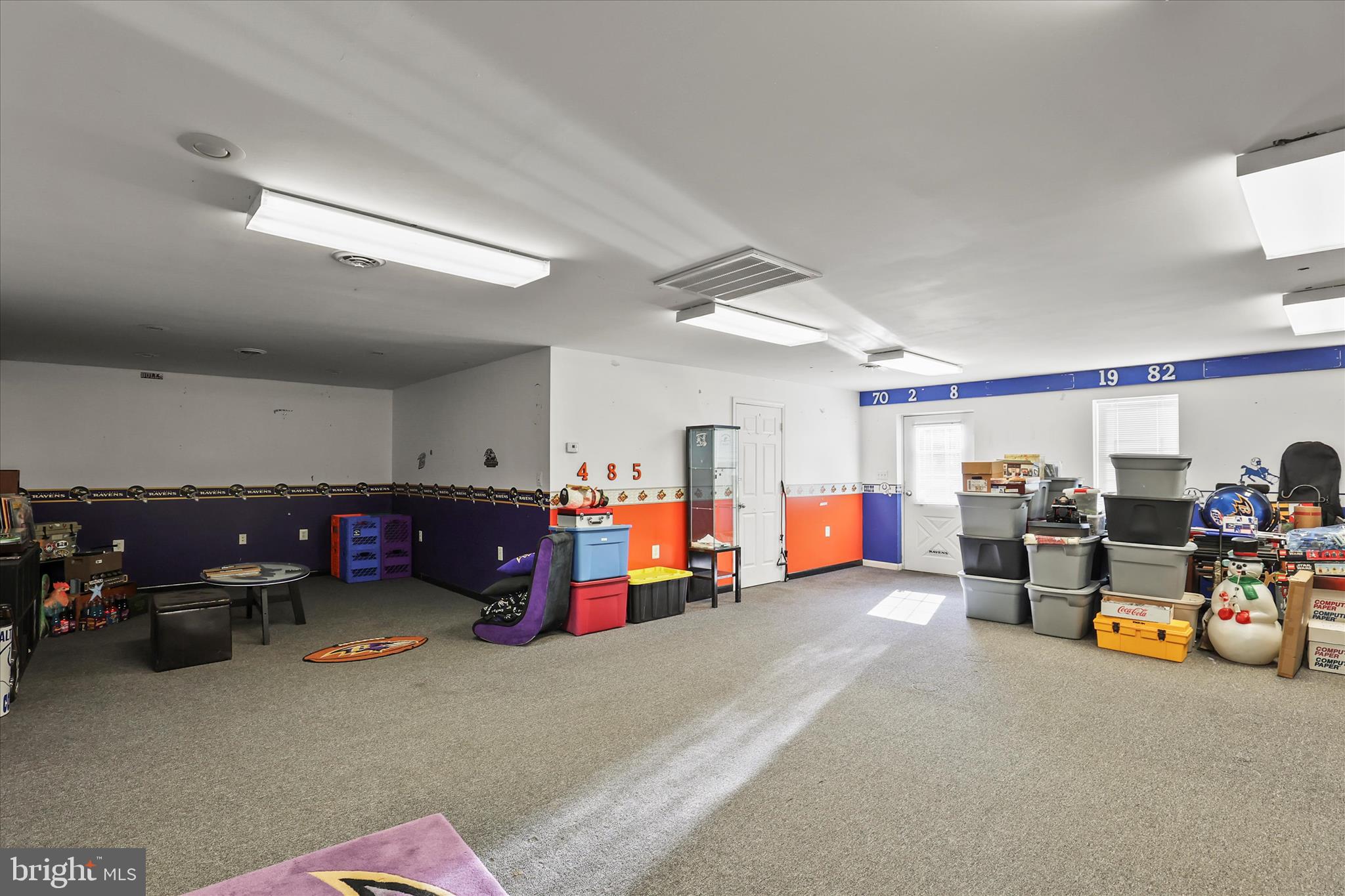 3220 Mt Carmel Road Upperco, MD 21155 - Photo 30 of 44 a view of a garage with a couch and many windows