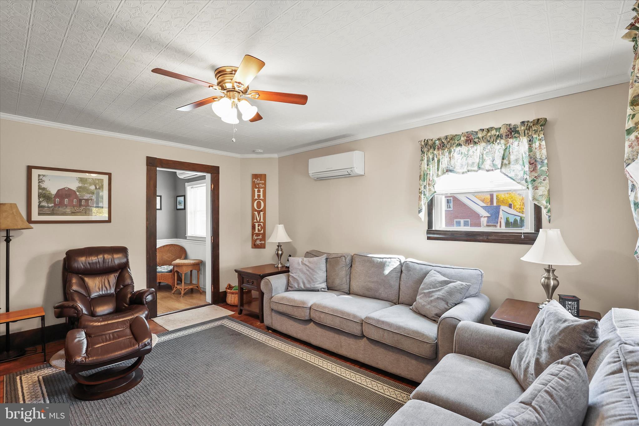 3220 Mt Carmel Road Upperco, MD 21155 - Photo 3 of 44 a living room with furniture a couch and a window