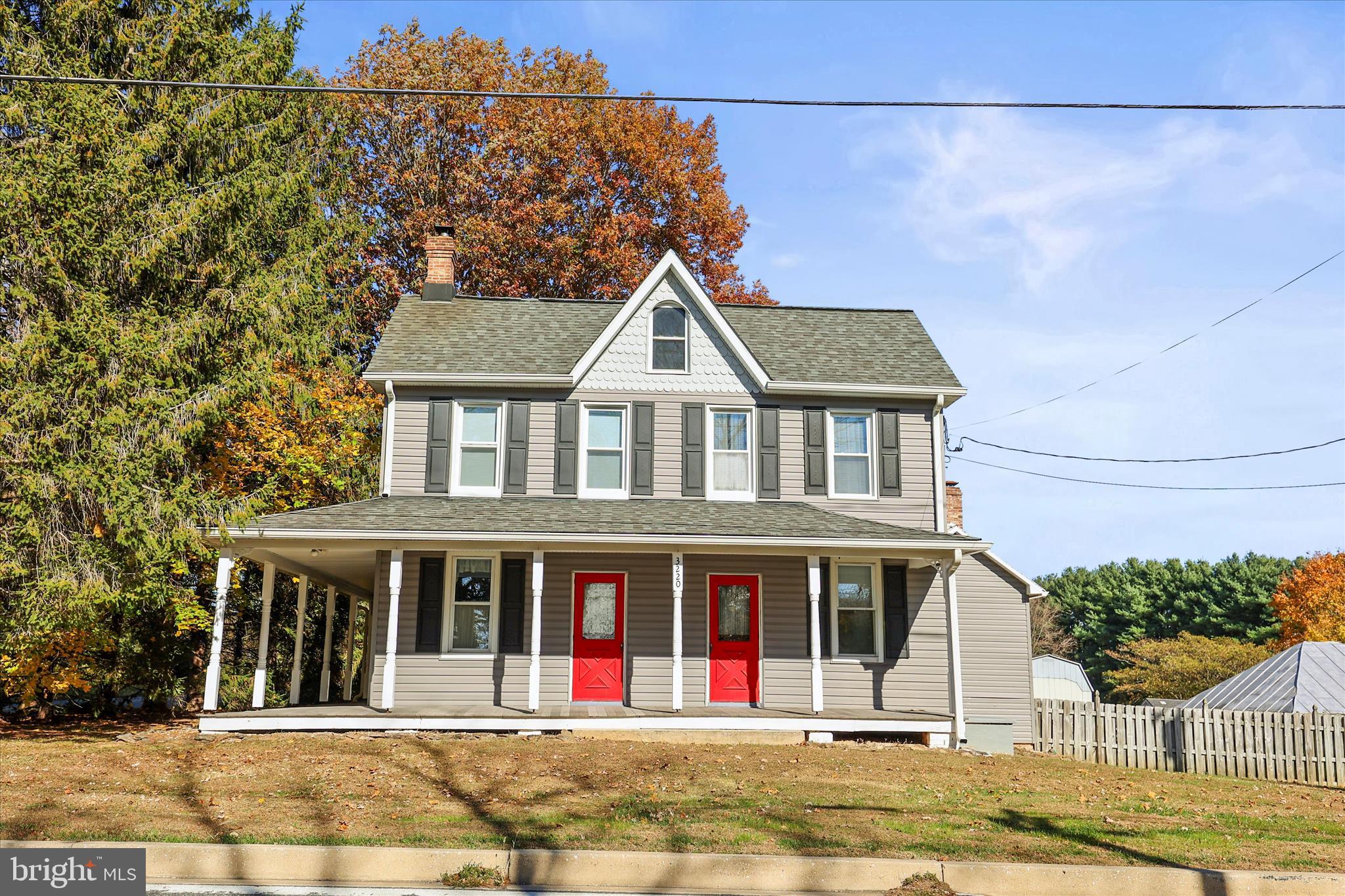 3220 Mt Carmel Road Upperco, MD 21155 - Photo 39 of 44 a front view of a house with a garden