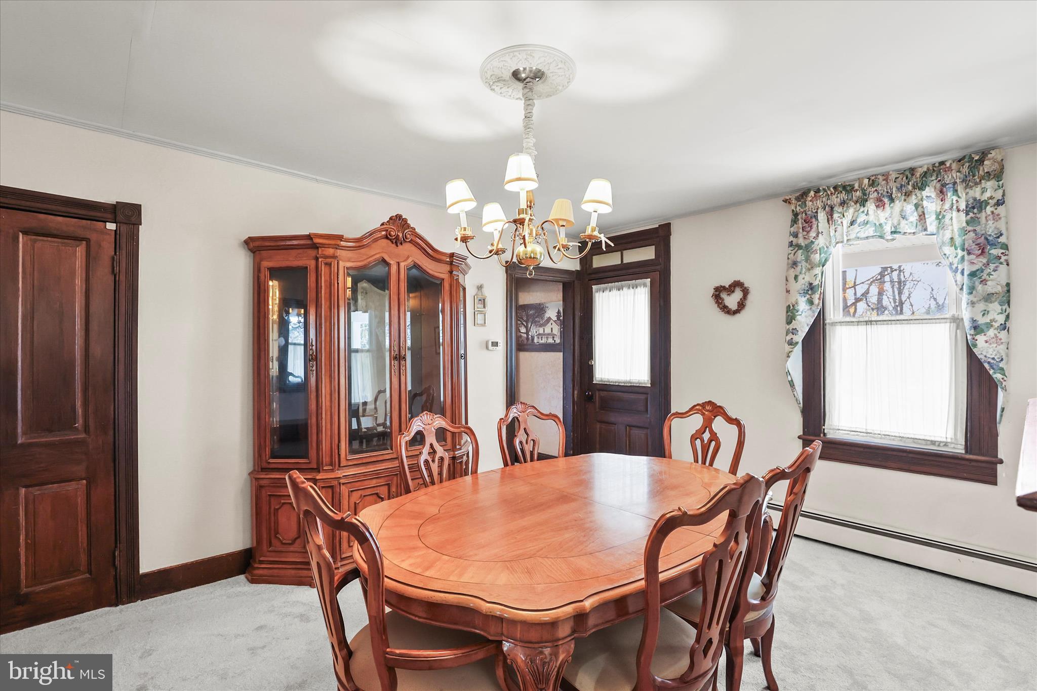 3220 Mt Carmel Road Upperco, MD 21155 - Photo 4 of 44 a view of a dining room with furniture and window