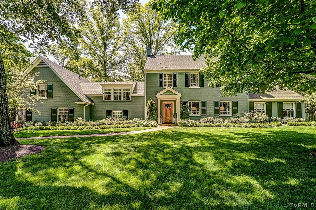 8909 Alendale Road Henrico, VA 23229 - Photo 1 of 1 a front view of a house with a garden