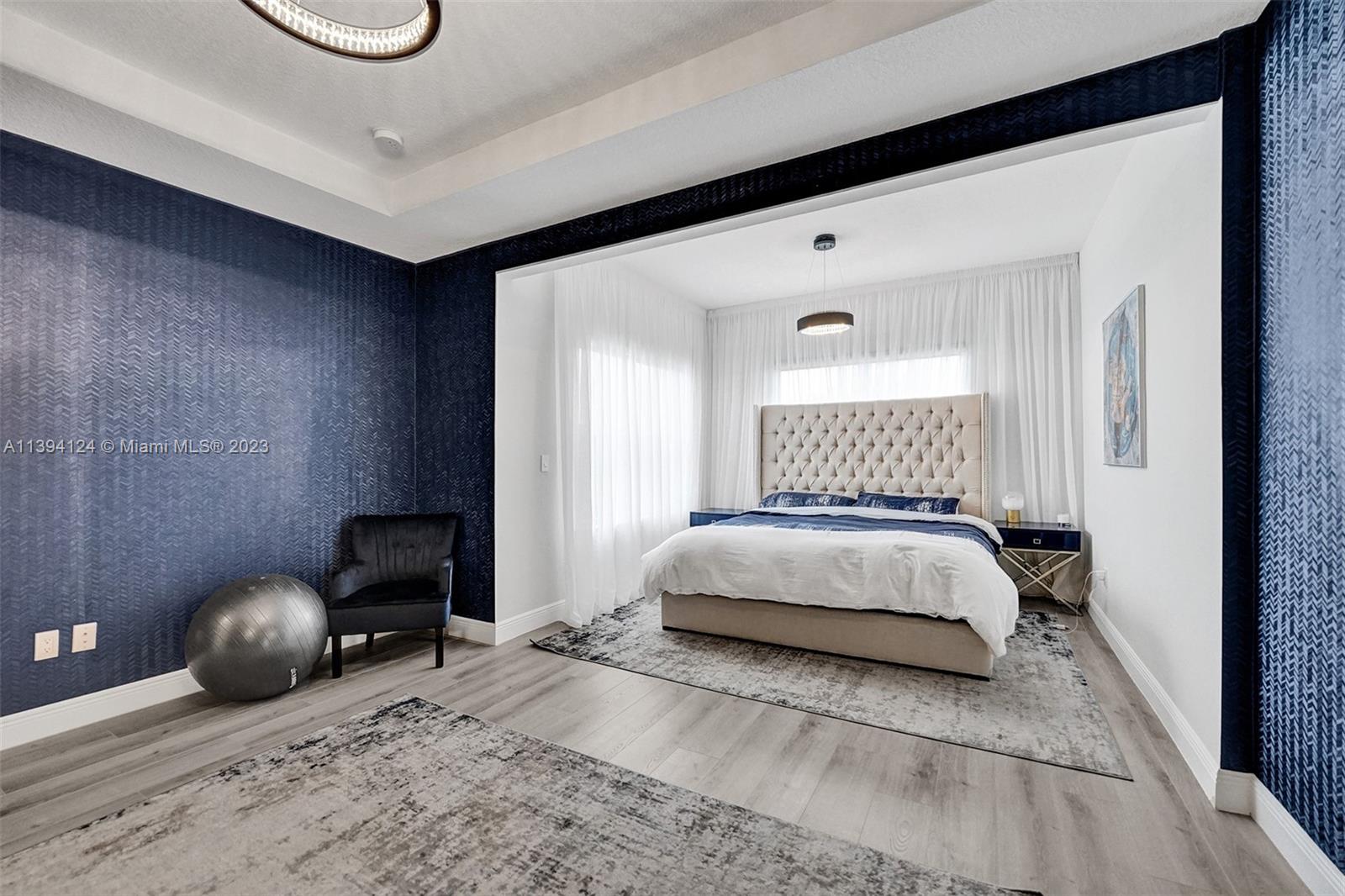 1033 Eucalyptus Drive Hollywood, FL 33021 - Photo 18 of 66 a bedroom with a bed and window