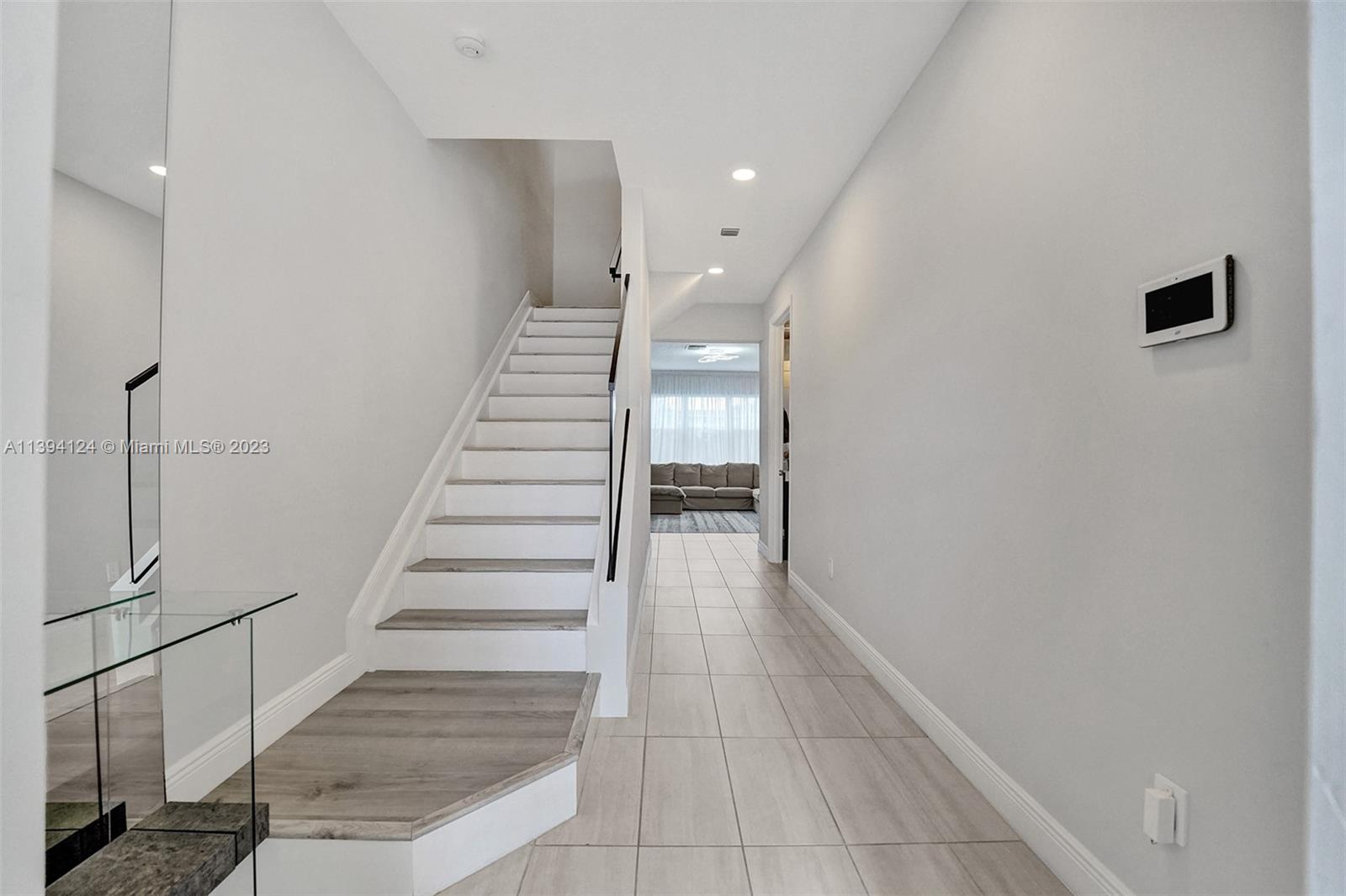1033 Eucalyptus Drive Hollywood, FL 33021 - Photo 3 of 66 a view of entryway and hall with wooden floor