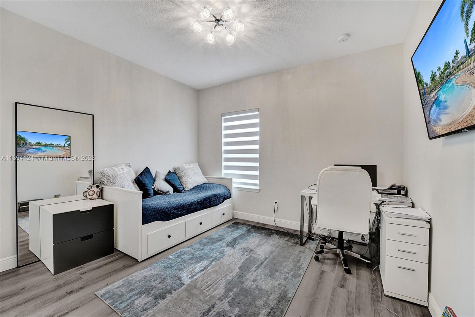 1033 Eucalyptus Drive Hollywood, FL 33021 - Photo 33 of 66 a living room with furniture and wooden floor