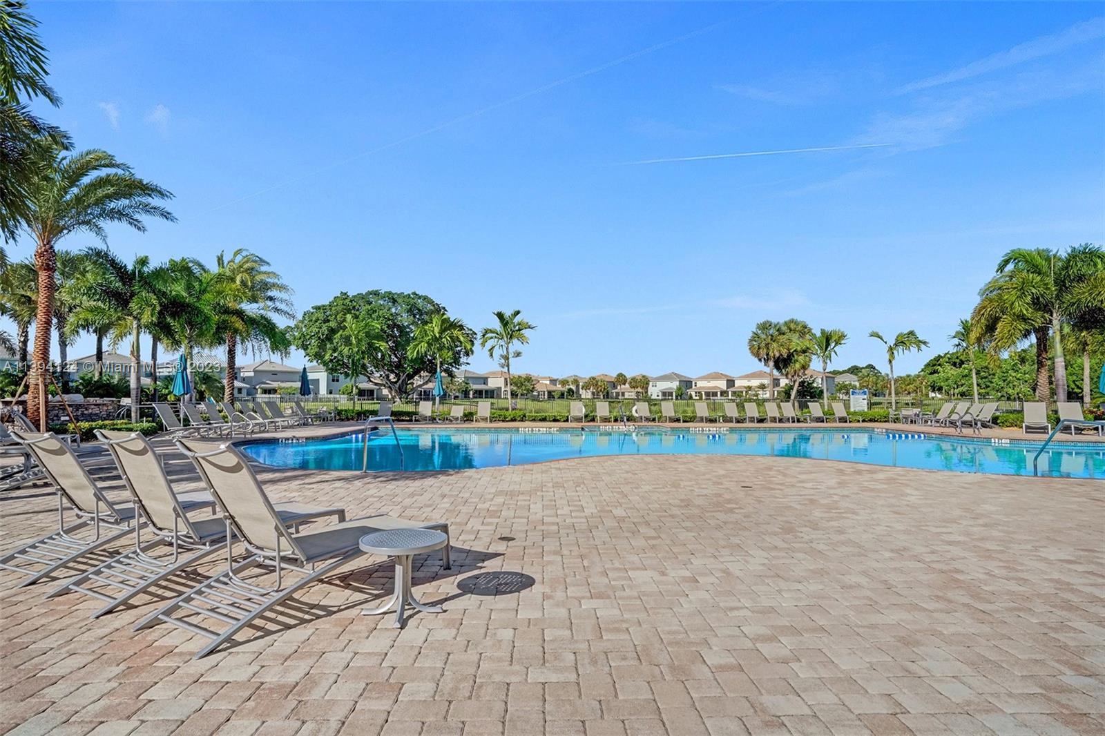 1033 Eucalyptus Drive Hollywood, FL 33021 - Photo 61 of 66 a view of swimming pool with outdoor seating and plants
