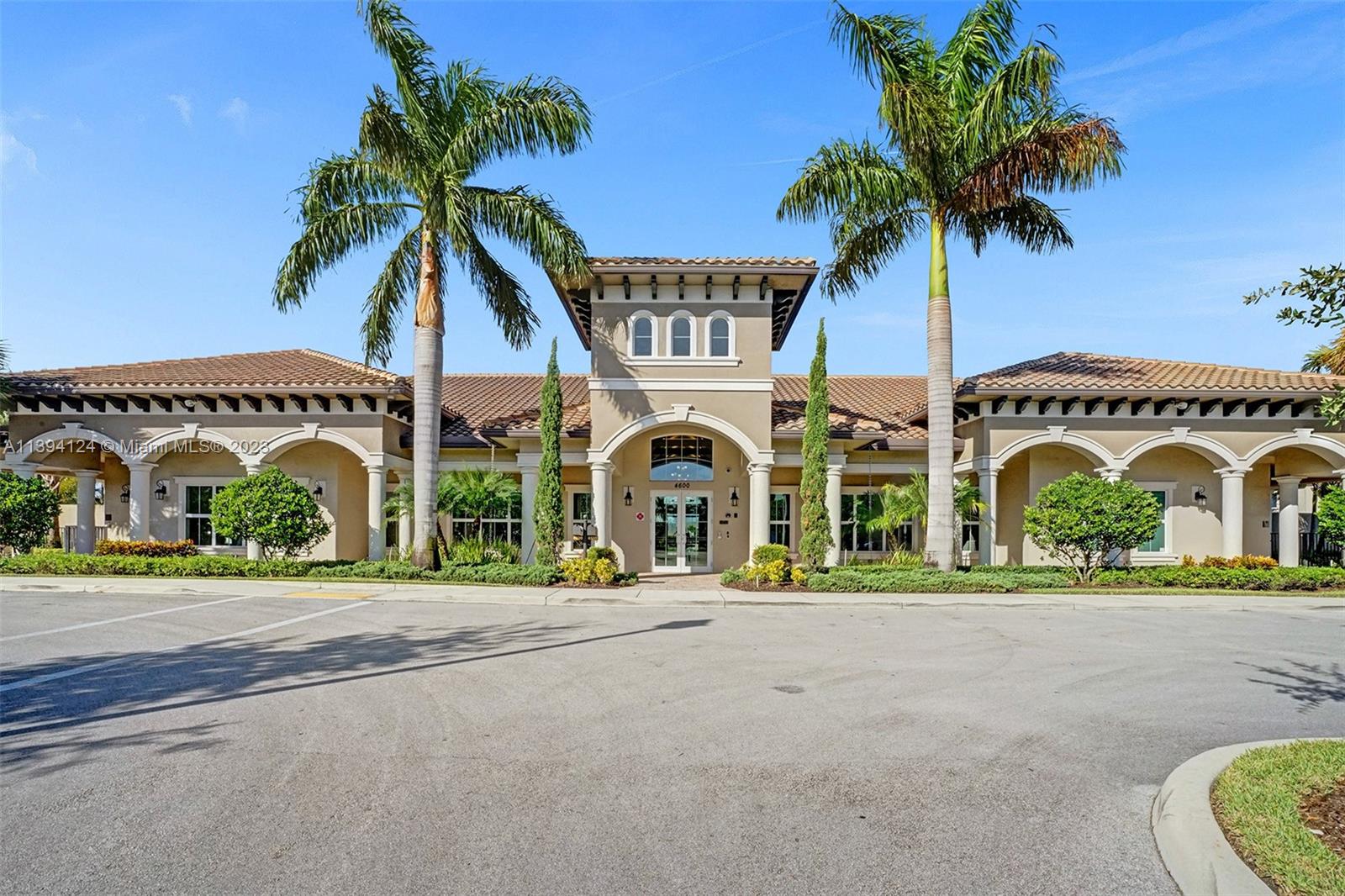 1033 Eucalyptus Drive Hollywood, FL 33021 - Photo 64 of 66 front view of a house with a garden