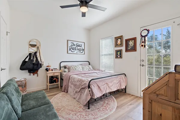 a bed room with a bed and a couch