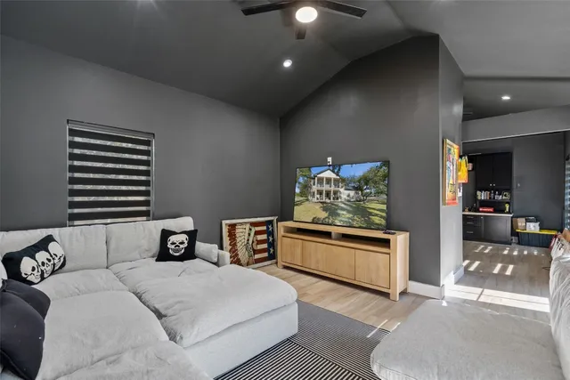 a bedroom with furniture and window