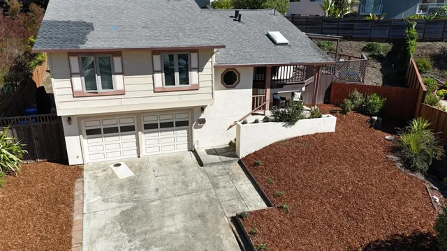 a house view with a outdoor space