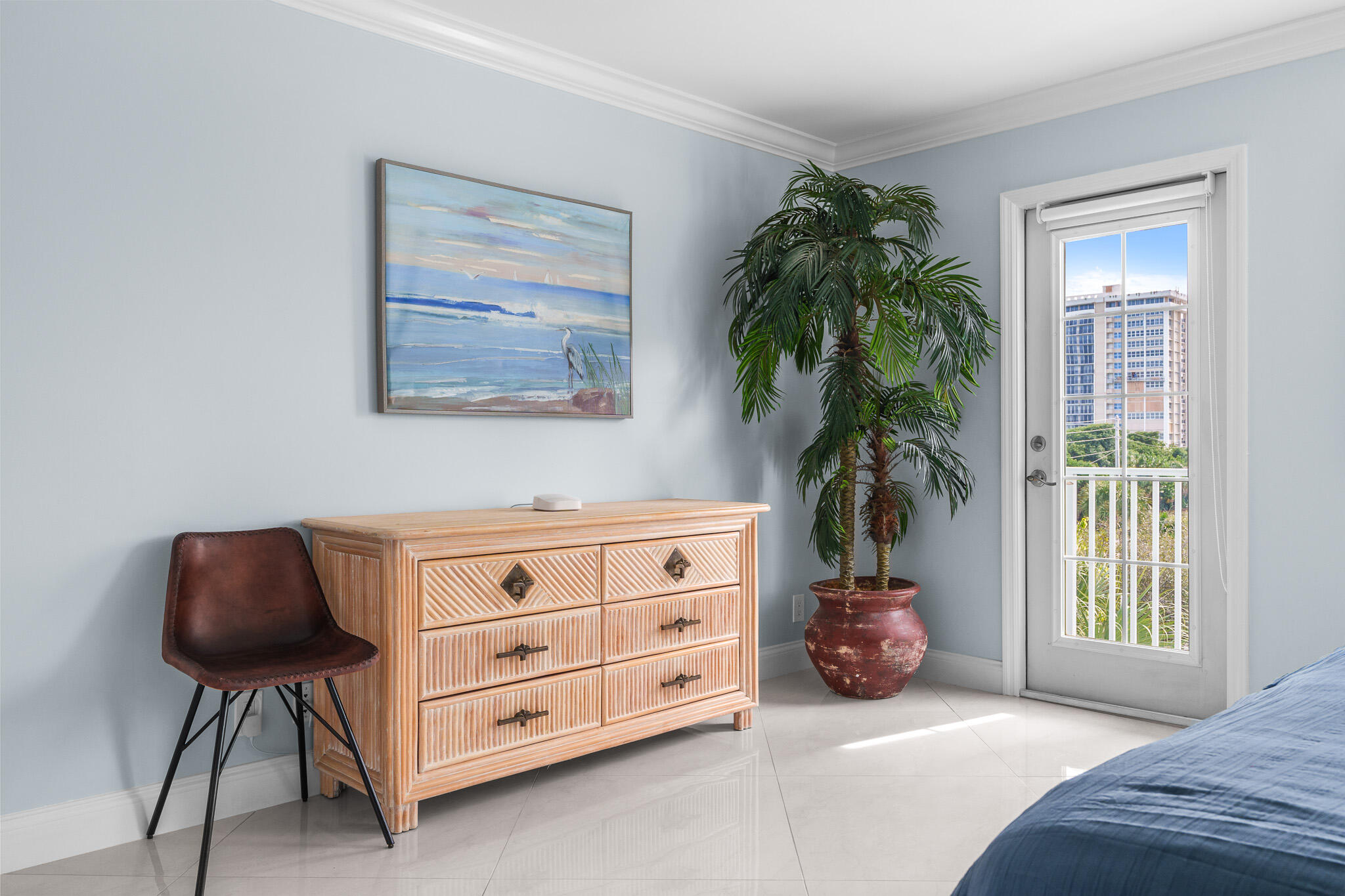950 Ponce De Leon Road, Unit 401 Boca Raton, FL 33432 - Photo 20 of 35 a living room with furniture and a potted plant