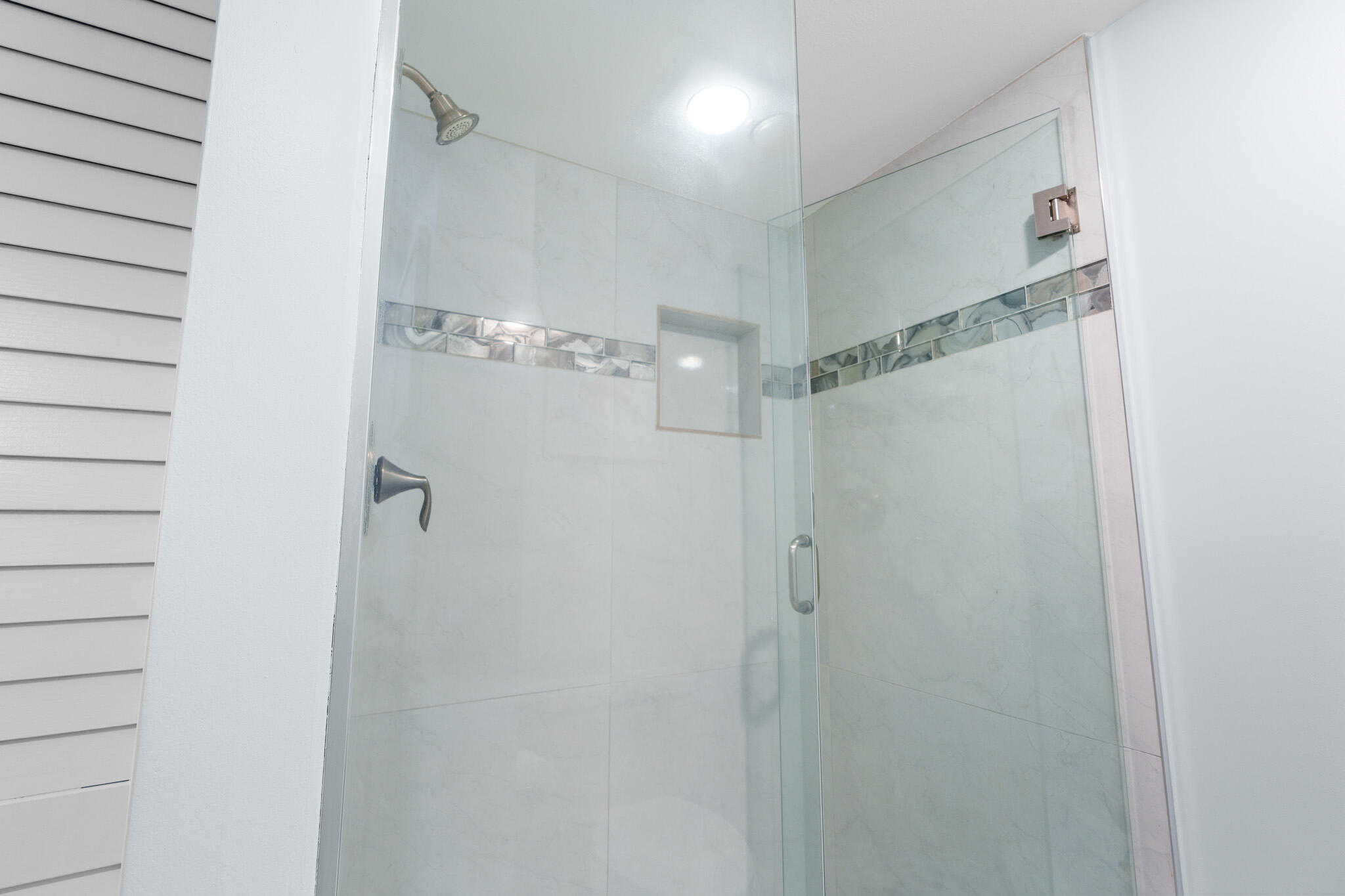 950 Ponce De Leon Road, Unit 401 Boca Raton, FL 33432 - Photo 23 of 35 a bathroom with a shower