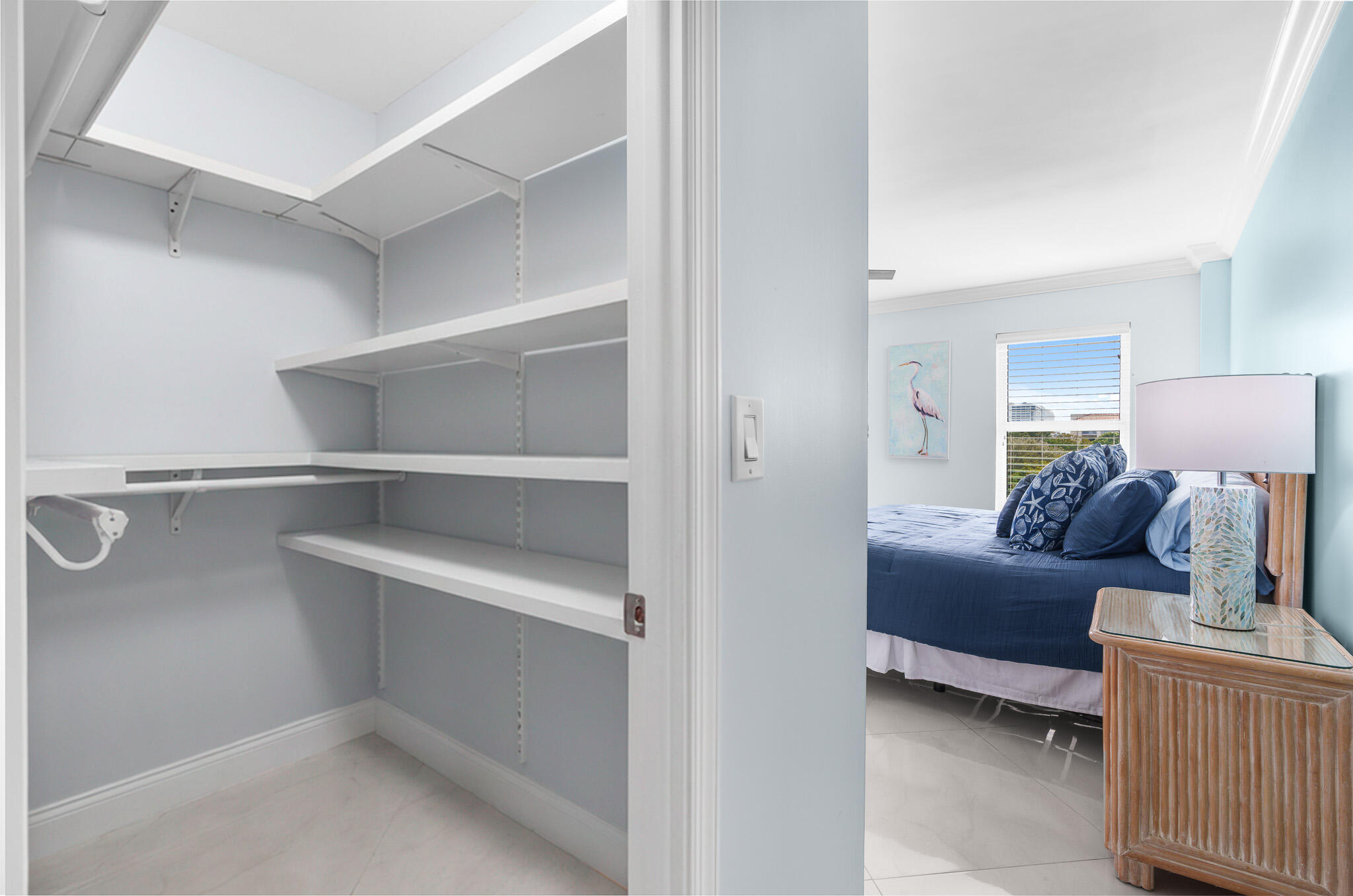 950 Ponce De Leon Road, Unit 401 Boca Raton, FL 33432 - Photo 24 of 35 a living room with furniture and a lamp