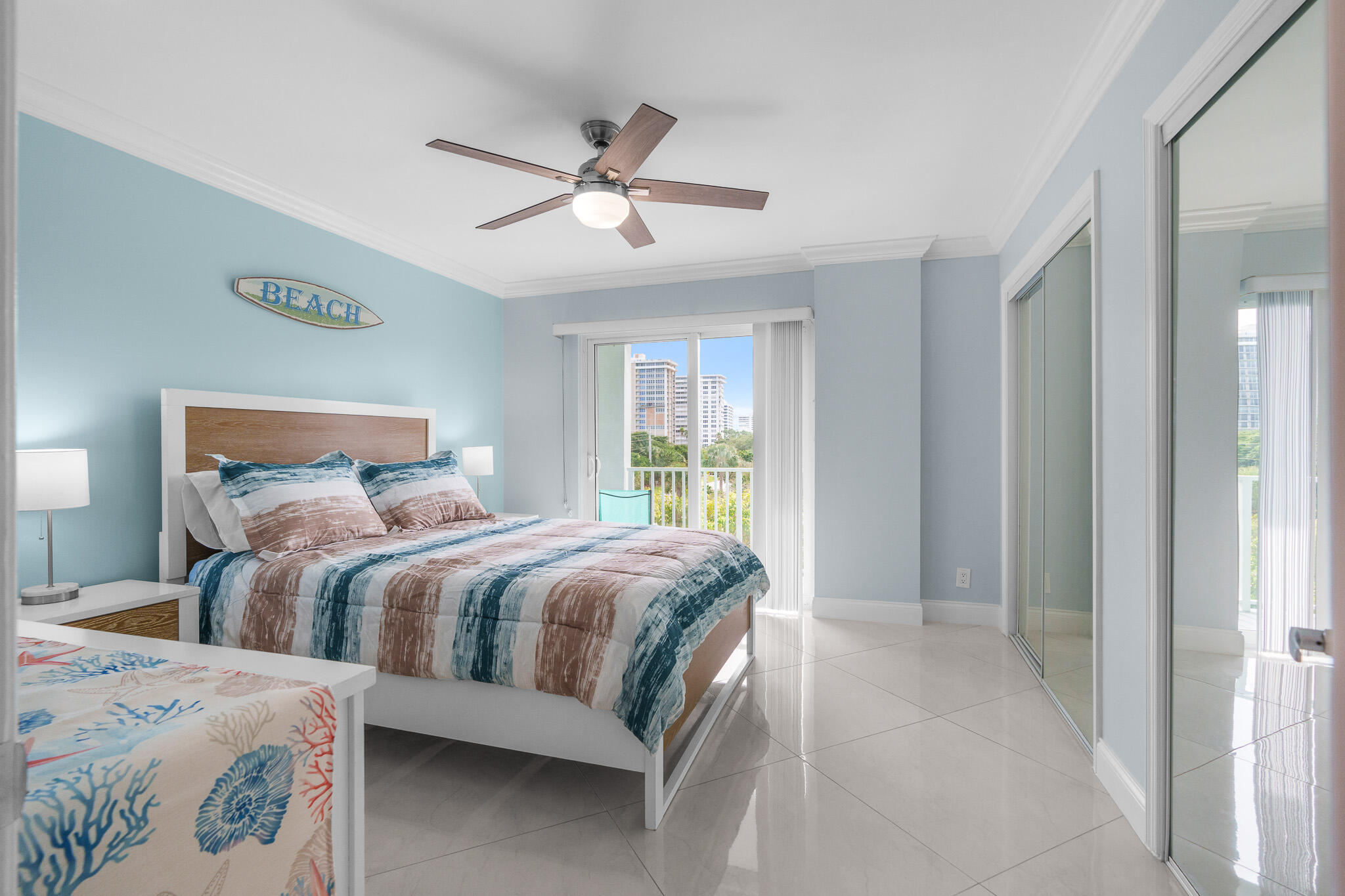 950 Ponce De Leon Road, Unit 401 Boca Raton, FL 33432 - Photo 25 of 35 a bed room with a bed and a window