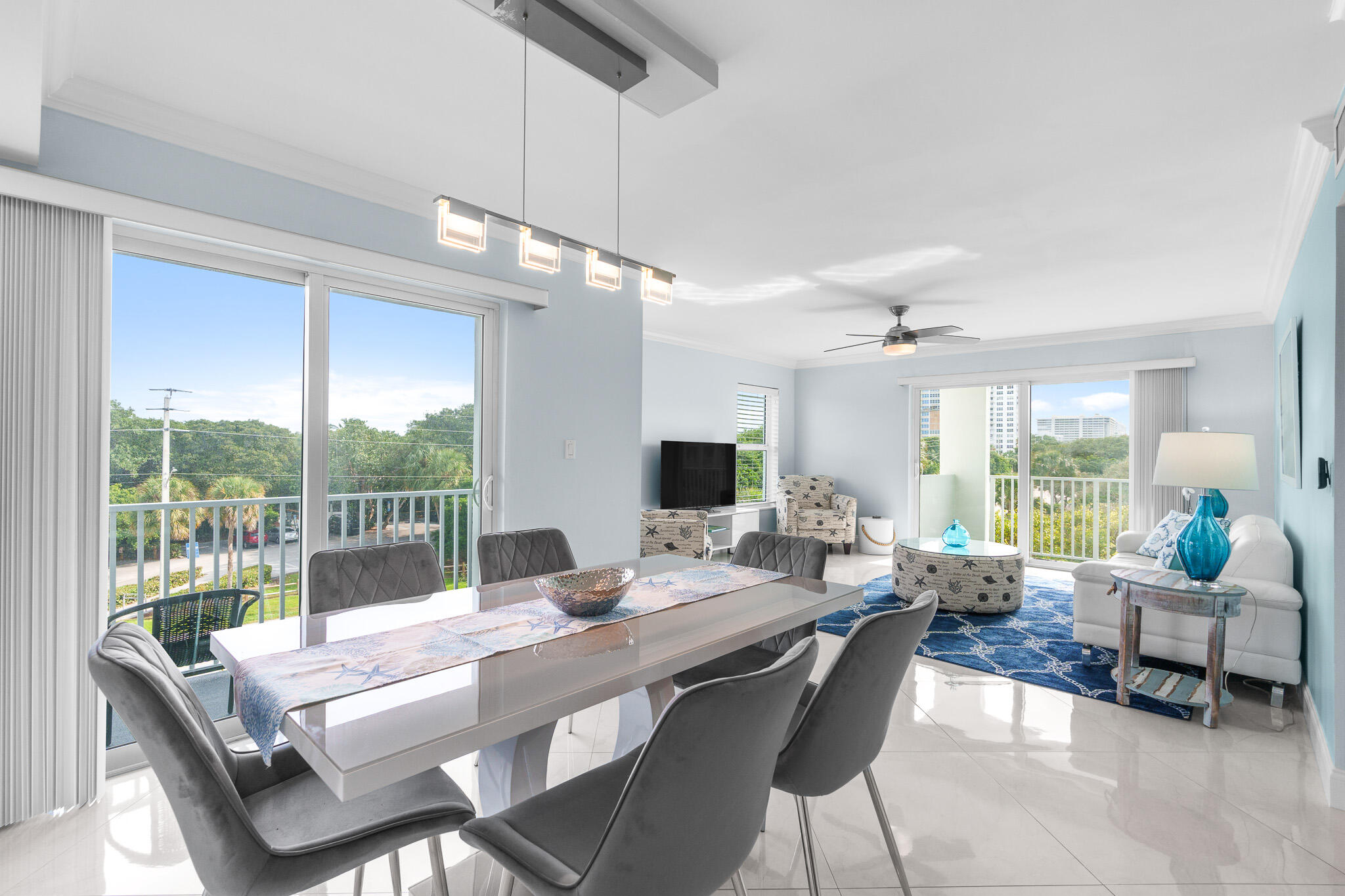 950 Ponce De Leon Road, Unit 401 Boca Raton, FL 33432 - Photo 3 of 35 a living room with furniture and a large window