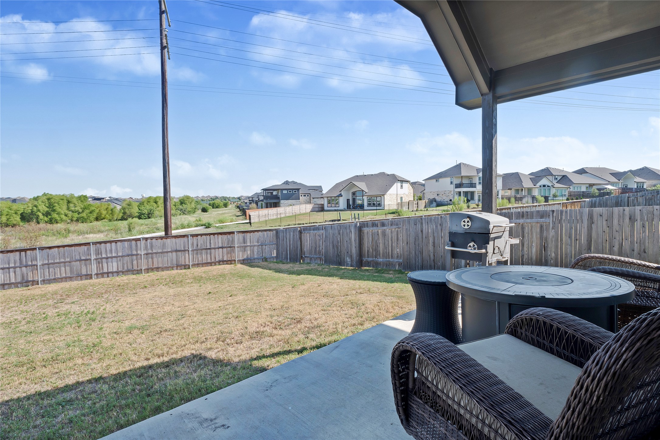 574 Sugar Cane Buda, TX 78610 - Photo 12 of 35 a view of a chairs in patio
