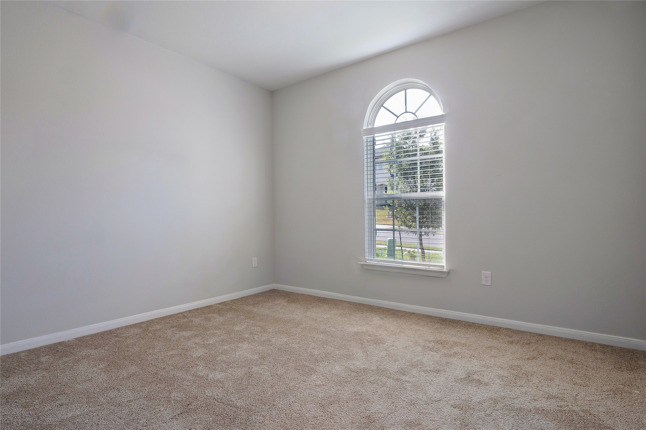 574 Sugar Cane Buda, TX 78610 - Photo 18 of 35 an empty room with a window