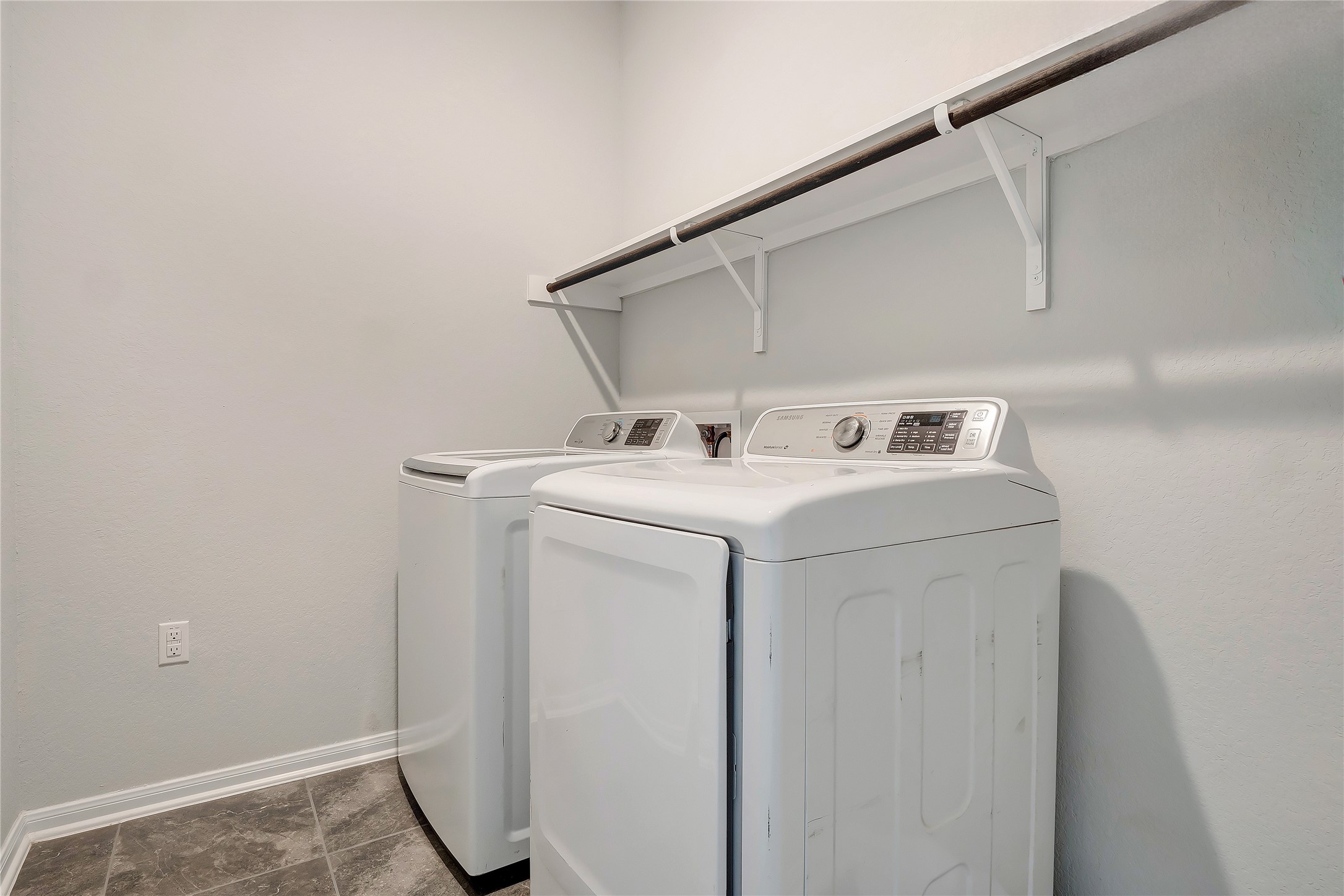 574 Sugar Cane Buda, TX 78610 - Photo 23 of 35 a utility room with dryer and washer