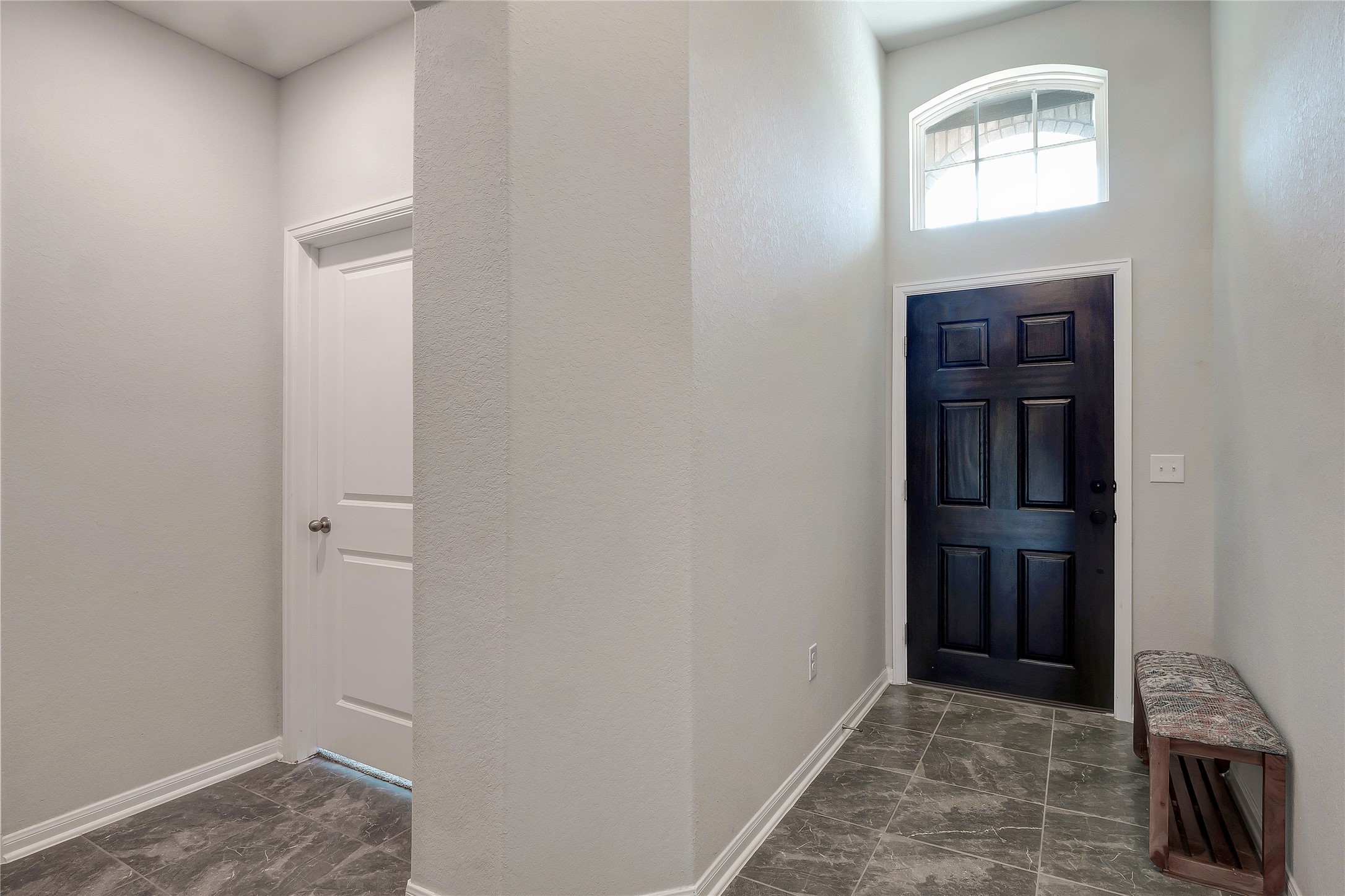 574 Sugar Cane Buda, TX 78610 - Photo 3 of 35 a view of hallway with window and stairs