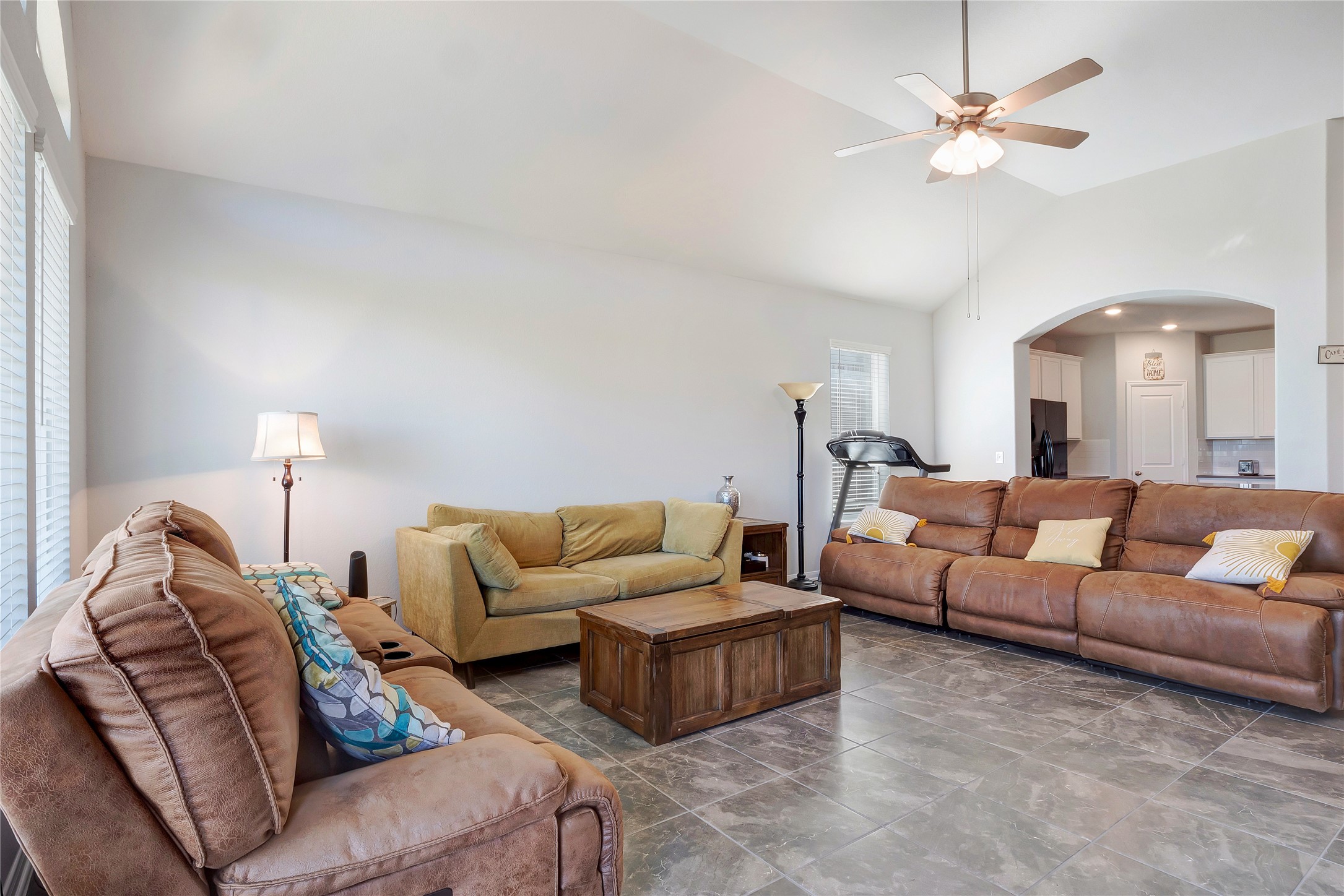 574 Sugar Cane Buda, TX 78610 - Photo 6 of 35 a living room with furniture a ceiling fan and a rug